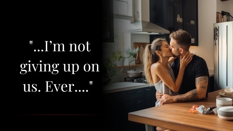 Married couple kissing behind a kitchen counter