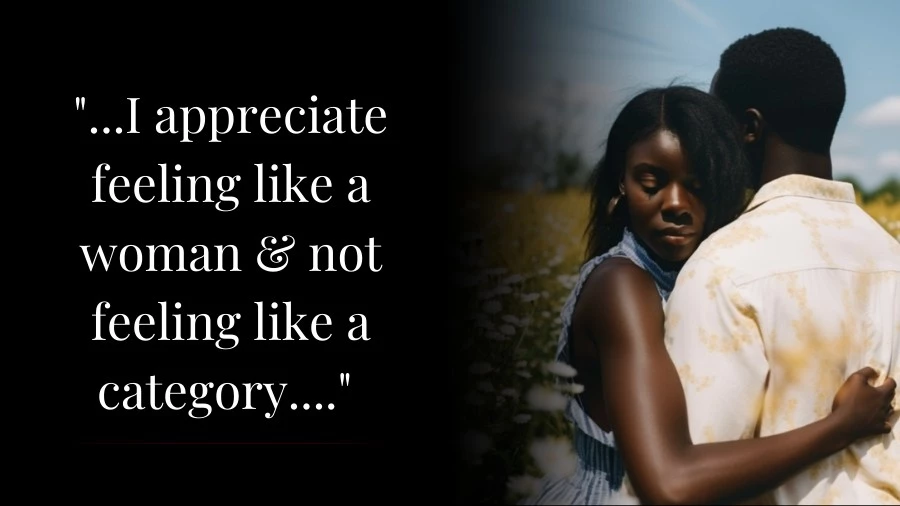 African couple hugging in a meadow on a warm summer day